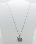 collana in acciaio inossidabile con sole con brillantini