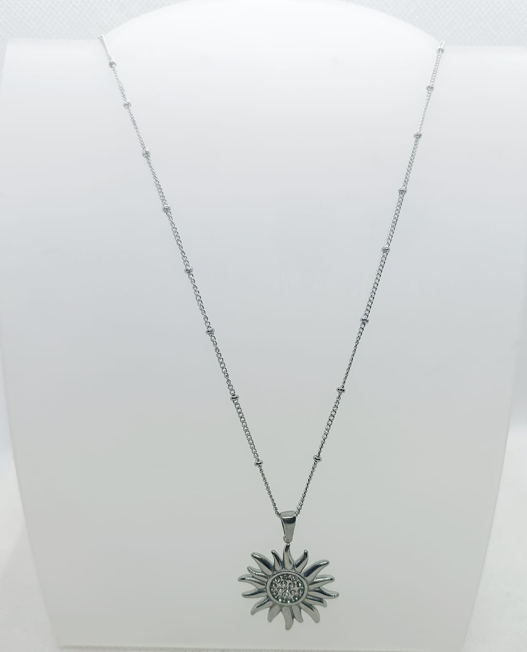 collana in acciaio inossidabile con sole con brillantini