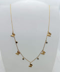 collana in acciaio inossidabile dorata con farfalline