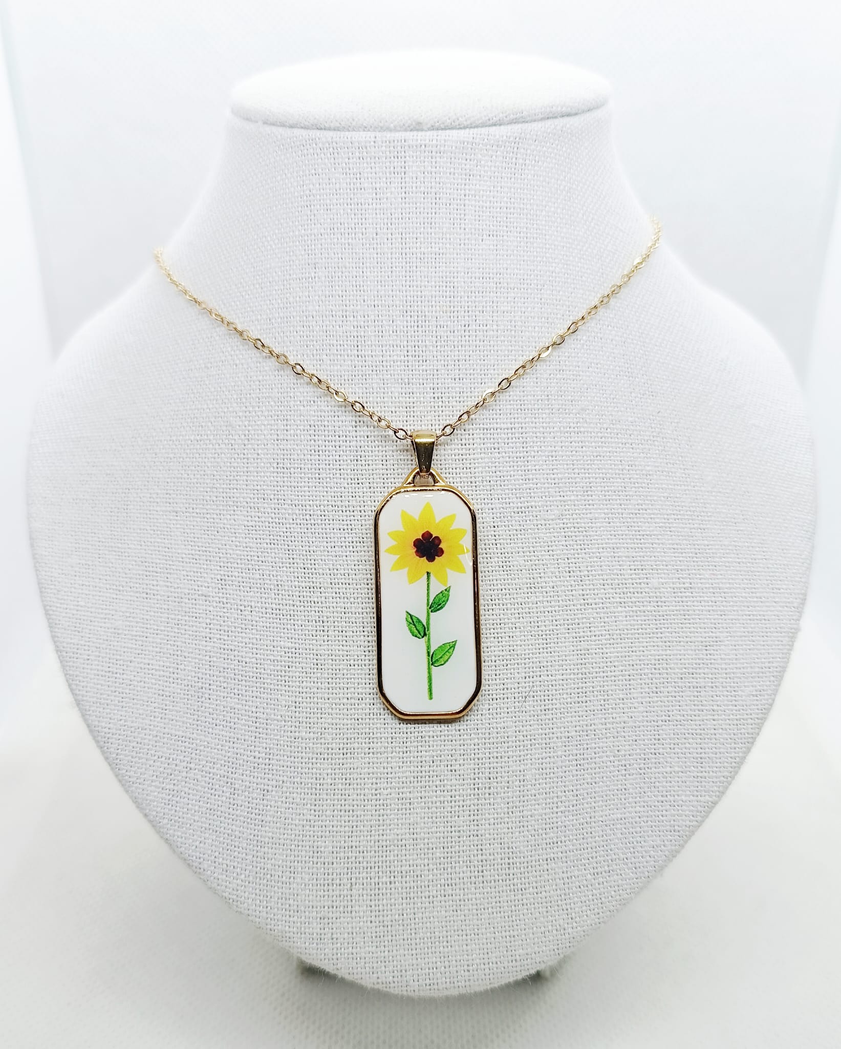 Collana con ciondolo floreale in acciaio inossidabile