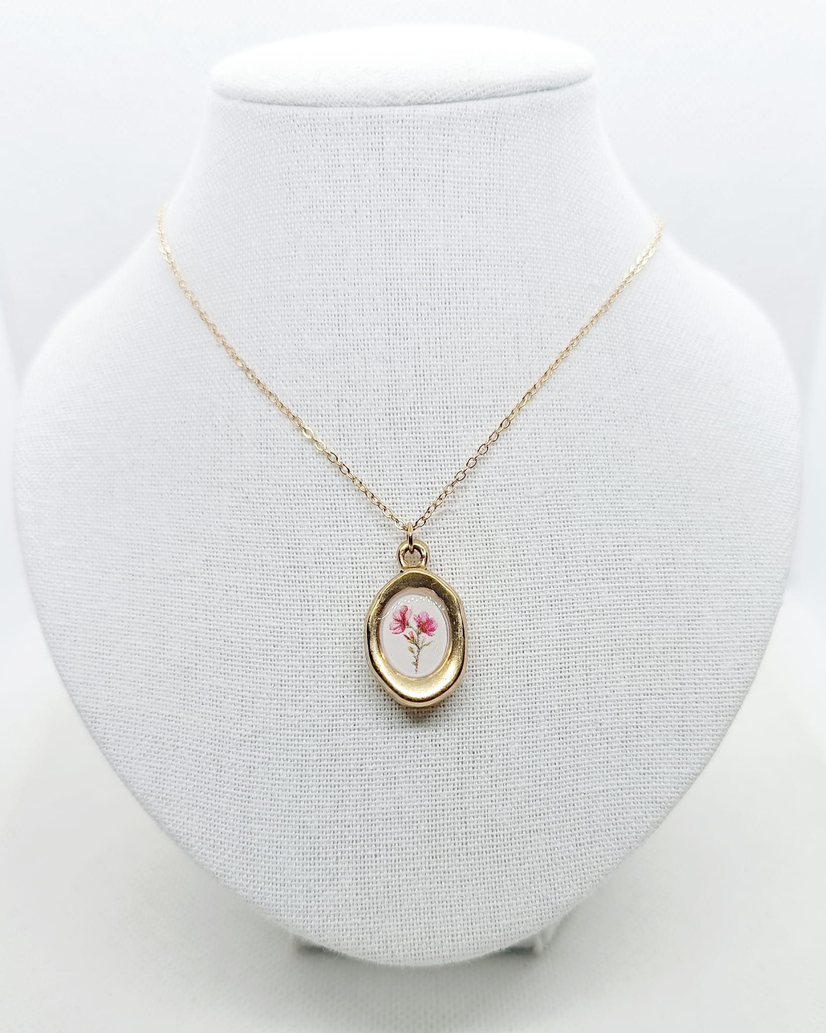 Collana con ciondolo floreale in acciaio inossidabile